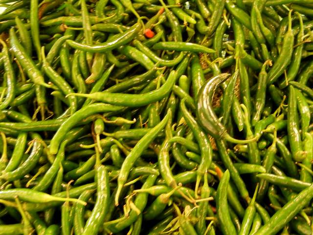 Long, narrow, straight, green chili peppers