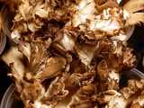 Hen of the woods mushrooms, a crinkly, curly fungus, whitish with brownish edges