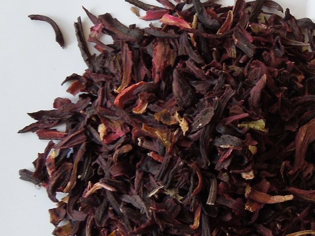 Hibiscus sepals, showing deep purple color with some reddish/pinkish hues