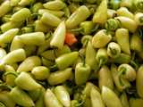 Caribe peppers, small, pointed, smooth, very light whitish green