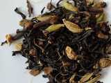 loose-leaf masala chai, showing black tea leaf, cardamom pods, clove, and other spices