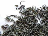 Loose-leaf green tea showing small leaves with a lightly curled shape
